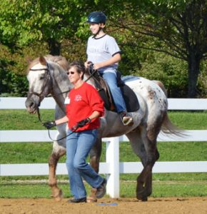 student on horse