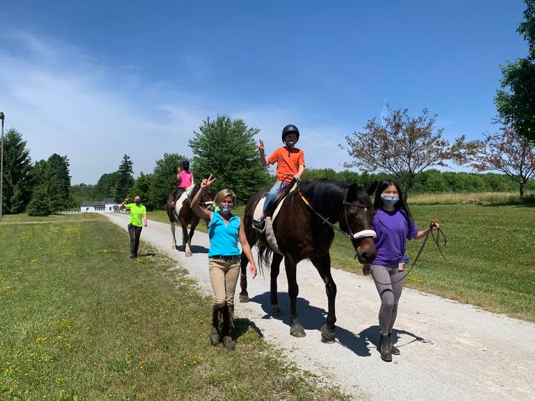 PATH instructor with student on horse