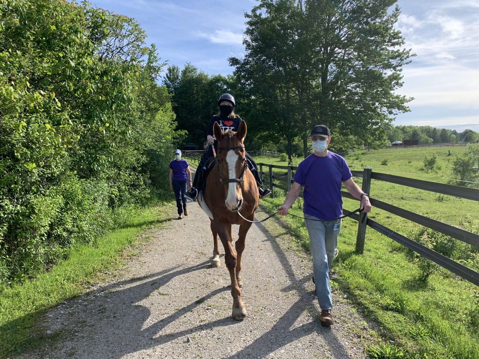 Student riding on trail